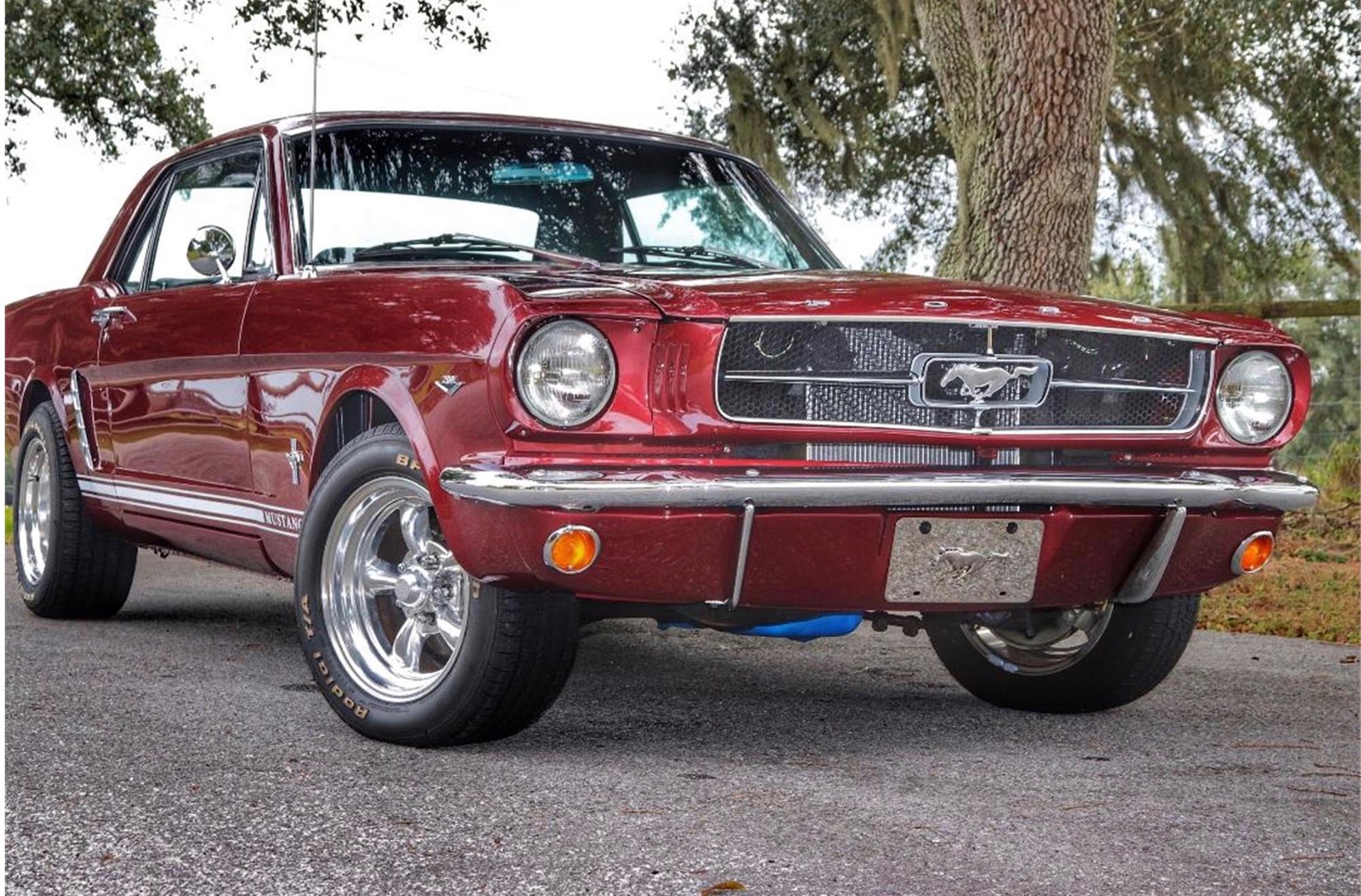 <img src="1965-ford-mustang-front.jpg" alt="A 1965 Ford Mustang with aftermarket modifications could get antique tag revoked">