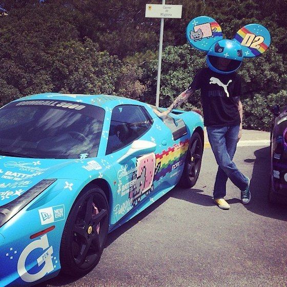 <img src="deadmau5-ferrari.jpg" alt="The musician Deadmau5 poses in front of the modified Ferrari he once owned">