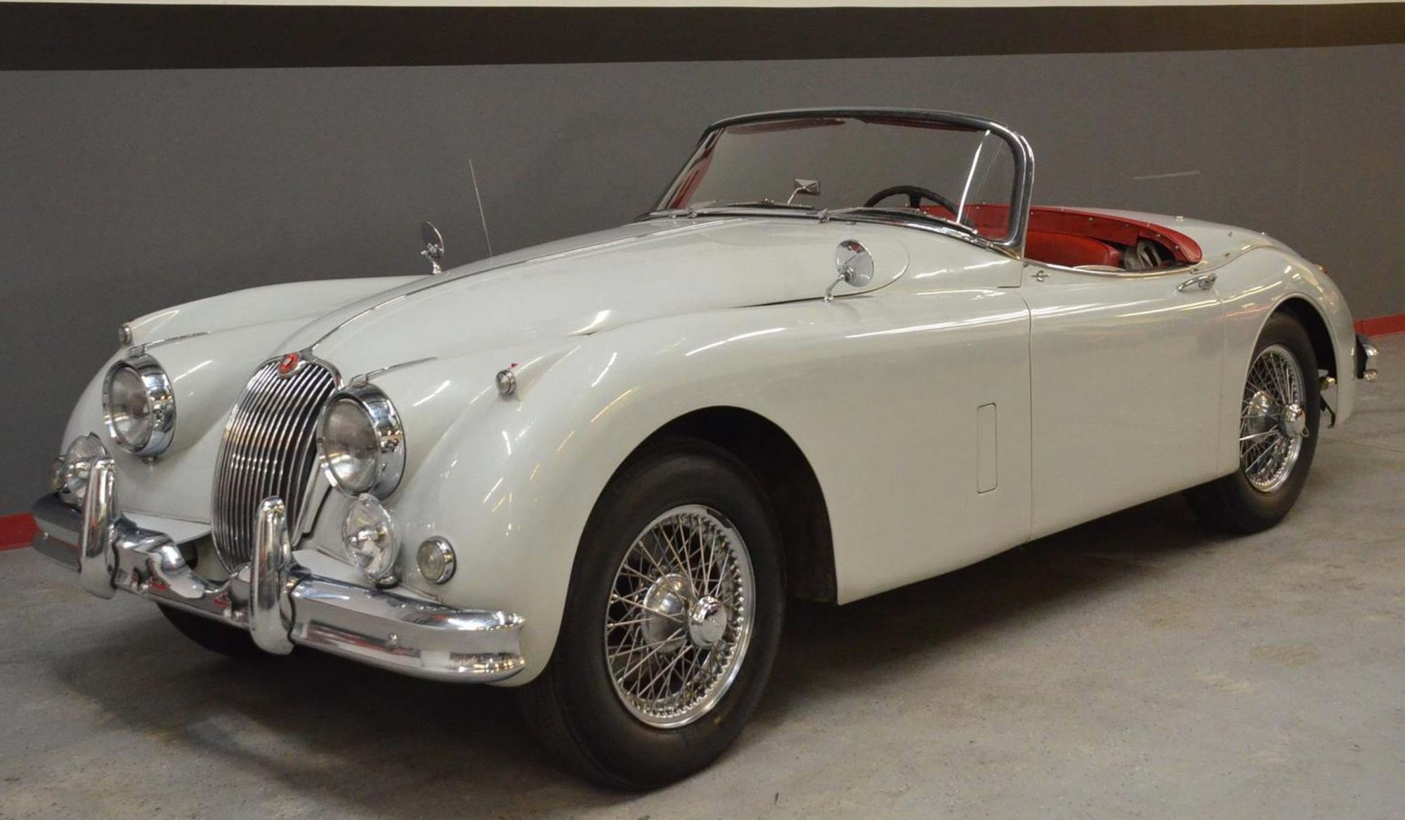 <img src="1959-jaguar-xk150-s.jpg" alt="A pristine 1959 Jaguar XK150 S up for bids with all proceeds going to chartity">