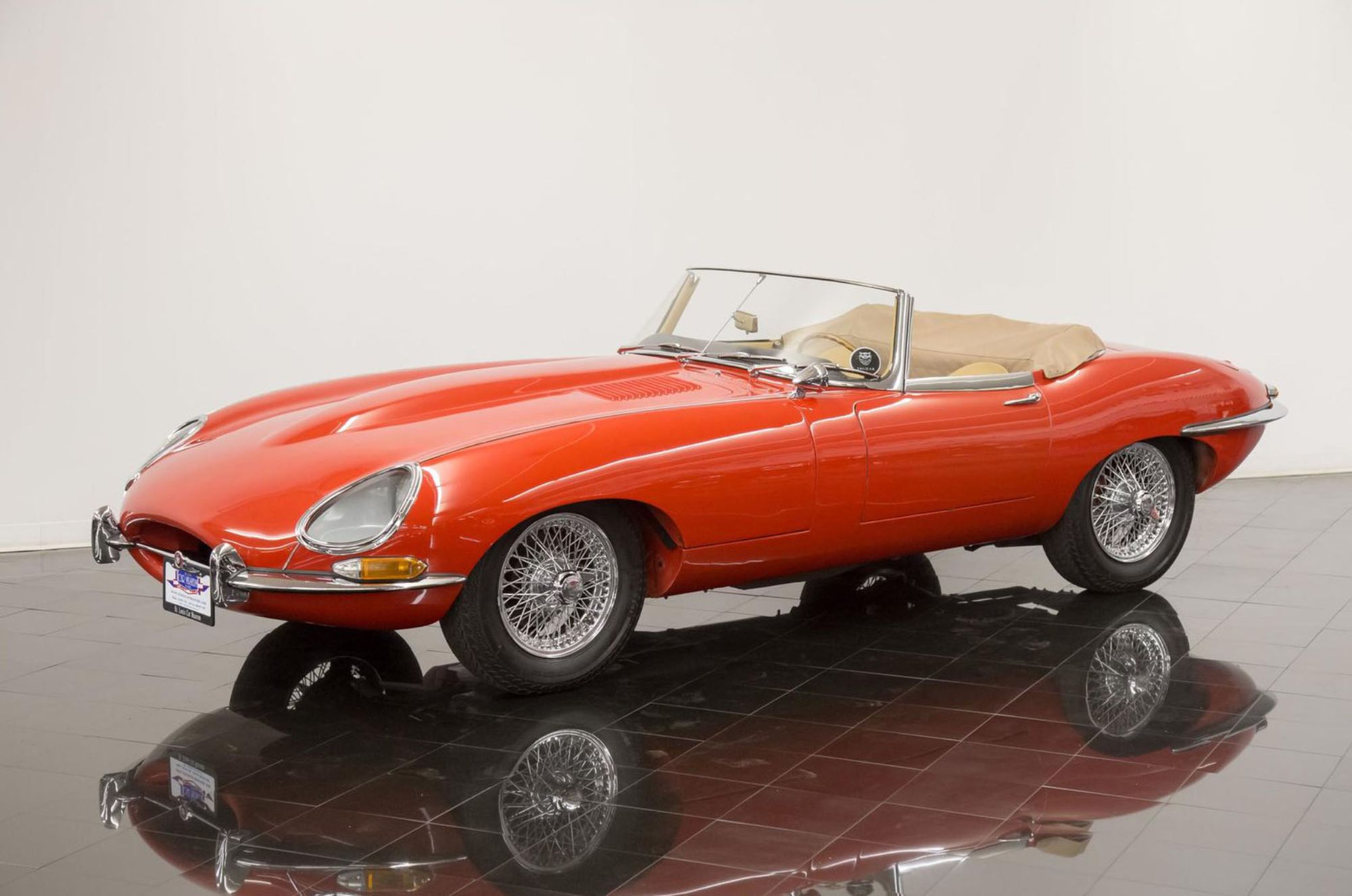 <img src="1964-jaguar-xke-e-type.jpg" alt="A stunning example of a 1964 Jaguar XKE E-Type Convertible">