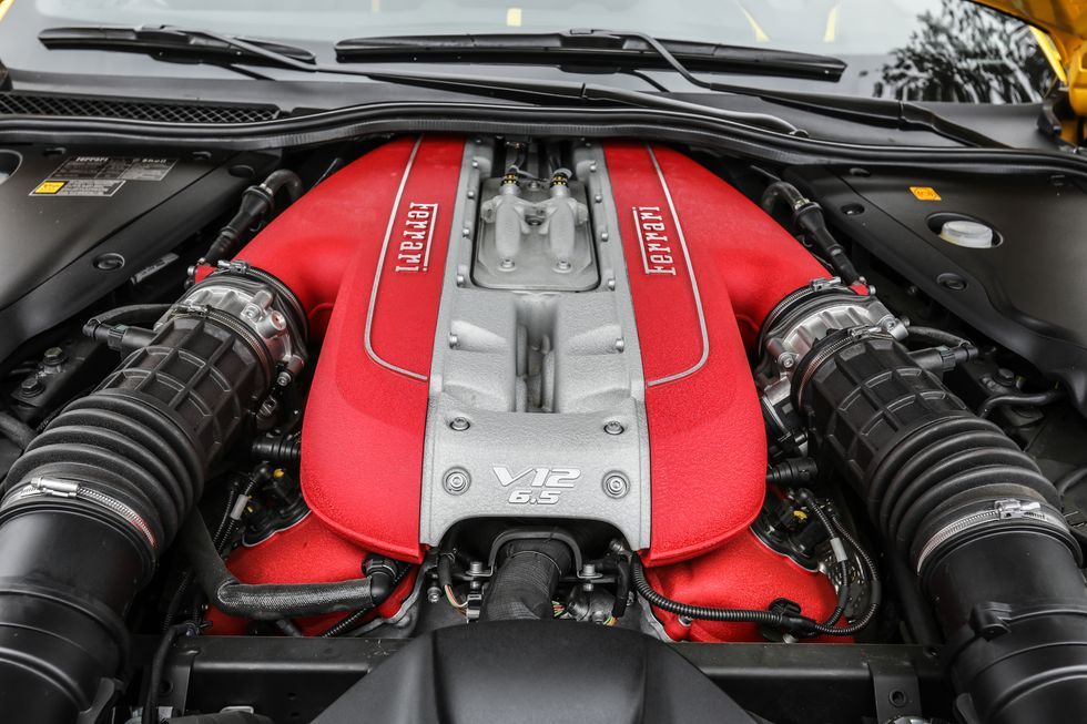 <img src="engine-ferrari.jpg"Ferrari F140 V12 engine">