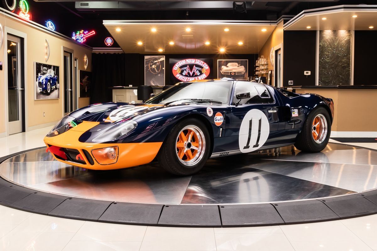 <img src="1965-ford-gt40.jpeg" alt="A 1965 Ford GT40 by Superformance">