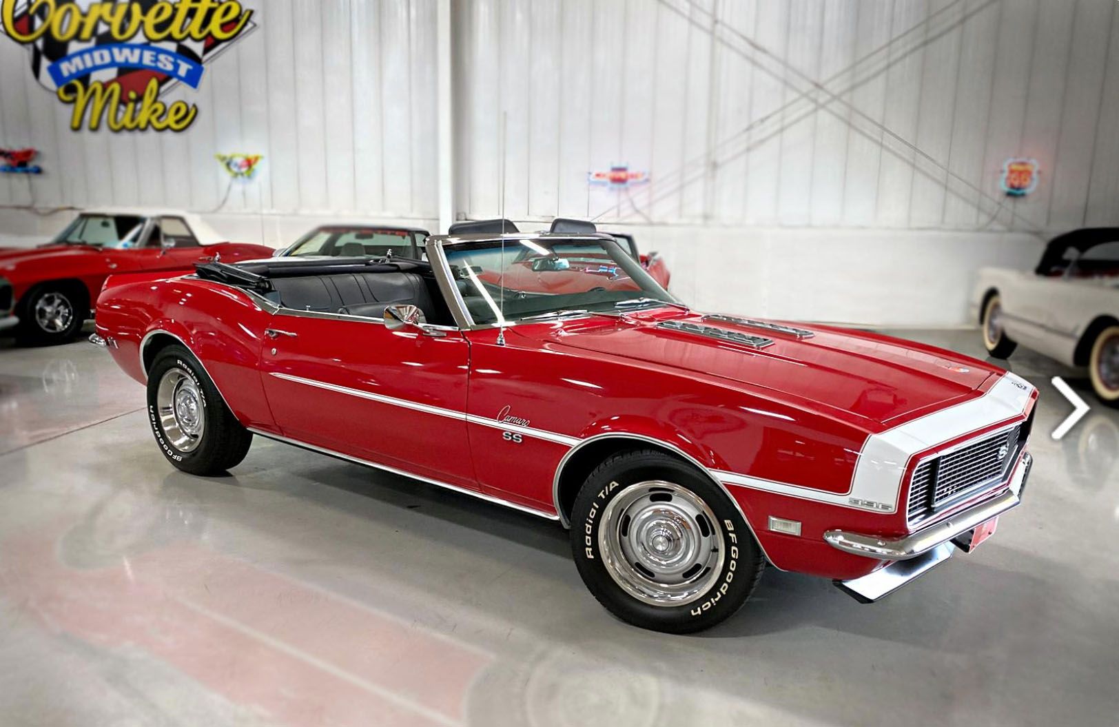 <auction-1968-chevy-camaro-rs-ss.jpg" alt="A stunning 1968 Chevrolet Camaro in Matador Red with white RS stripes">