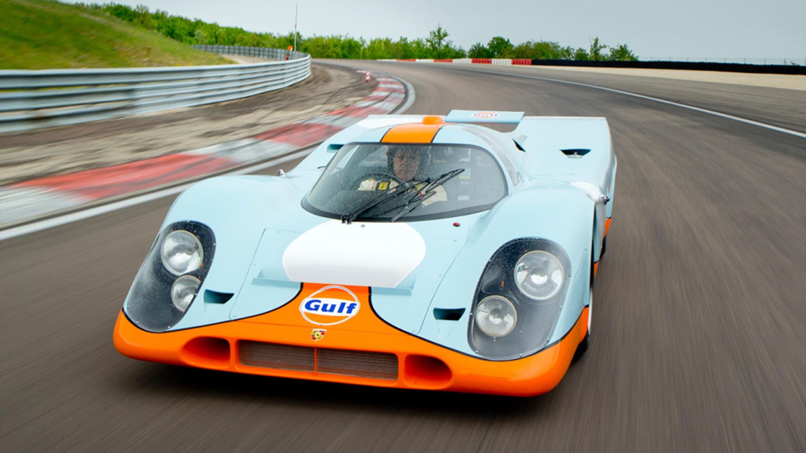 <img src="auction-1970-gulf-porsche.jpg" alt="A 1970 Porsche 917K in Gulf livery also featured in the movie Le Mans">