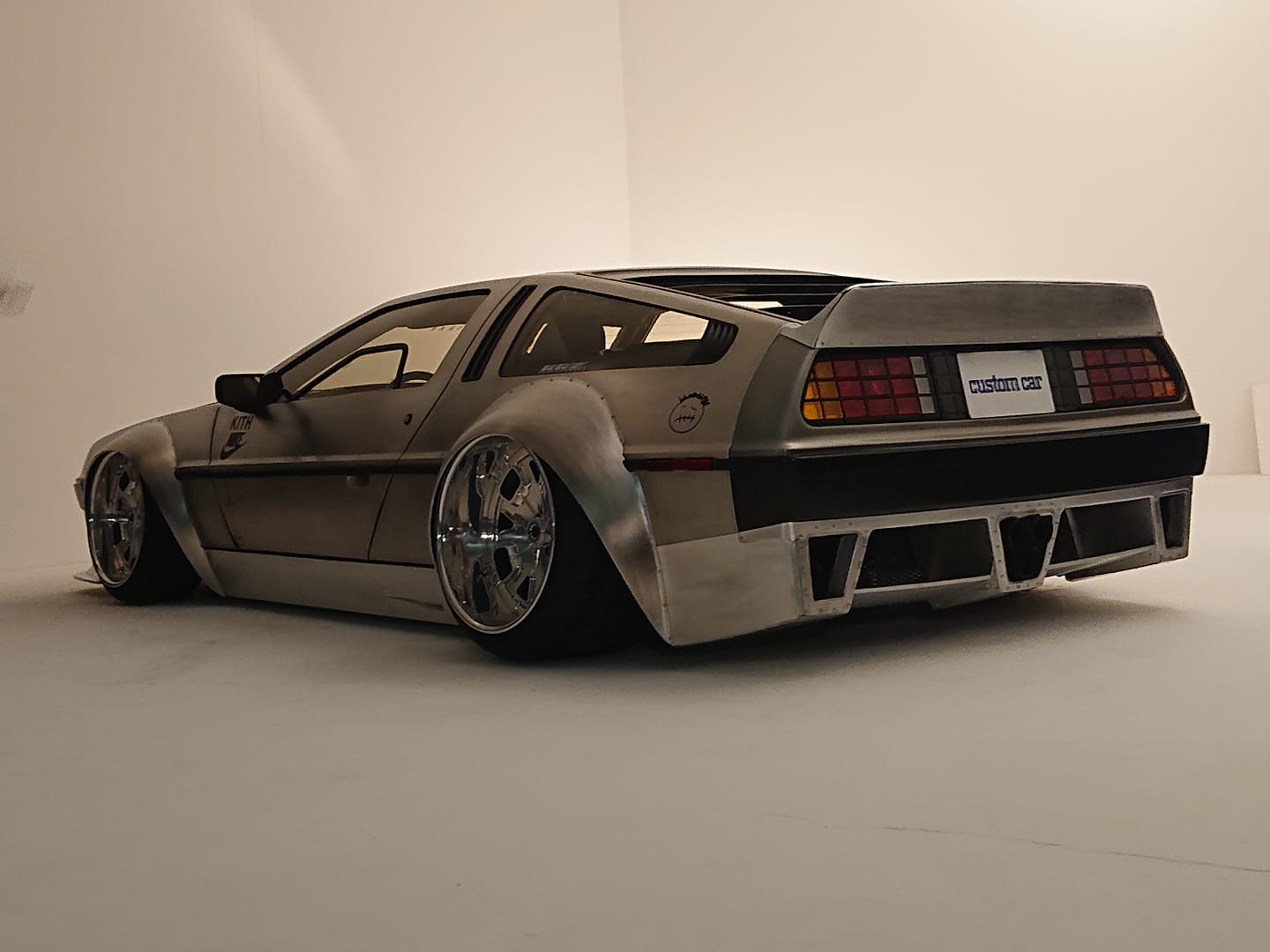 <img src="delorean-widebody.jpg" alt="A wide-body DeLorean built by Risky Business Co Ltd">