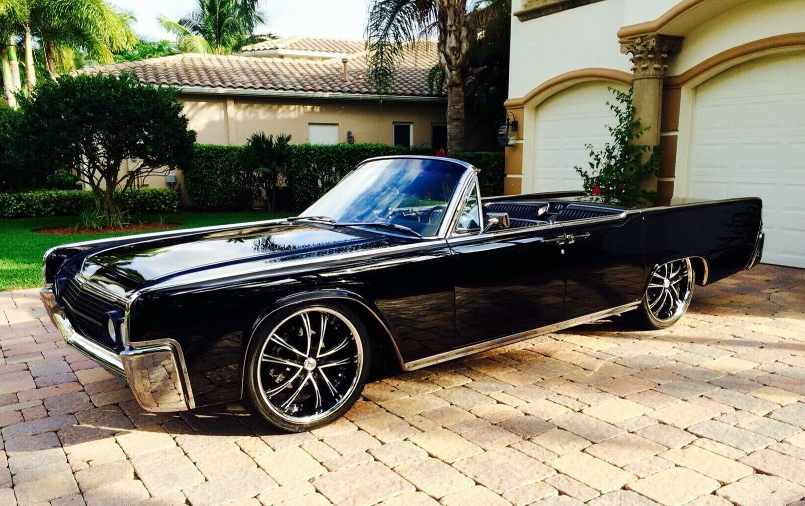 <img src="1963-lincoln-continental-convertible.jpeg" alt="A 1963 Lincoln Continental convertible">