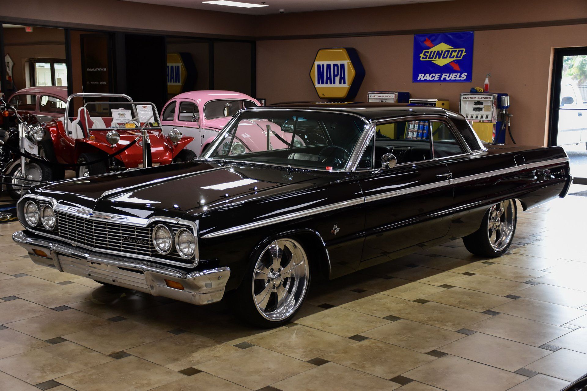 <img src="1964-impala.jpeg" alt="A 1964 Chevrolet Impala 409 built into a 482 stroker">