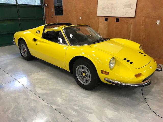 <img src="1972-ferrari-dino-2.jpg" alt="A restored 1972 Ferrari GTS Dino">