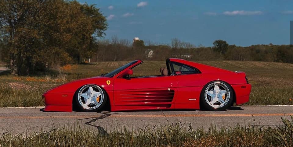 <img src="ferrari-profile.jpg" alt="A 1991 Ferrari 348 TS sitting on air suspension">