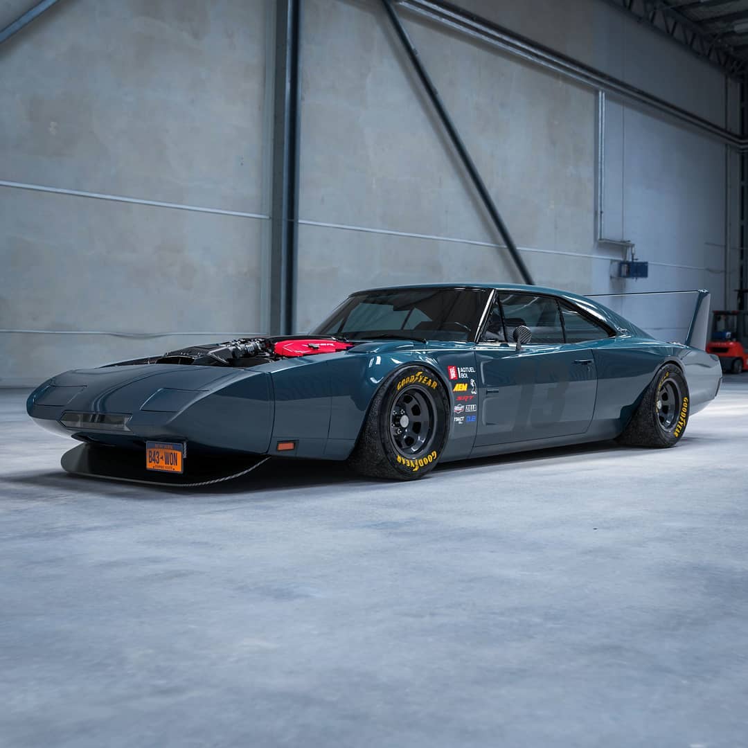 <img src="modern-dodge-daytona.jpg" alt="Modernized 1969 Dodge Daytona rendering with a Viper V10 engine">
