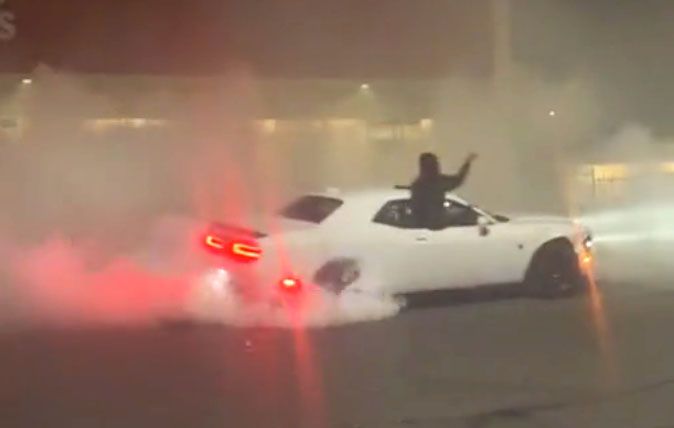 <img src="dodge-hellcat.jpg" alt="A Dodge Challenger Hellcat stolen by looters">