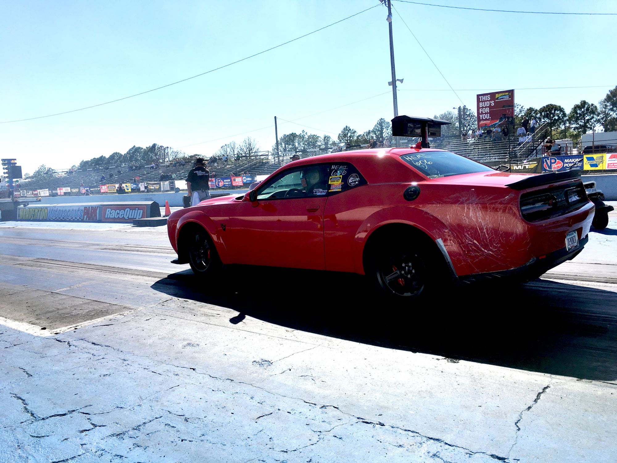 <img src="dodge-challenger.jpg" alt="Dodge Challenger at the drag strip">