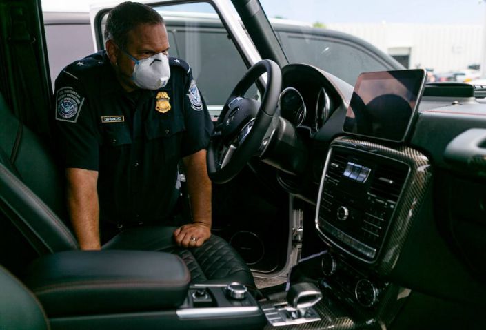 <img src="luxury-cars-2.jpg" alt="Seized luxury car in Port Everglades">