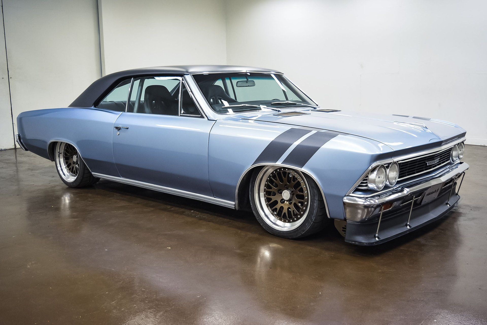 <img src="1966-malibu.jpeg" alt="A 1966 Chevrolet Chevelle Malibu Pro-Touring">