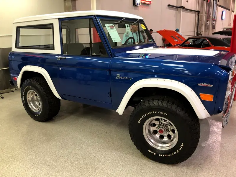 <img src="1969-bronco.png" alt="A completely restored 1969 Ford Bronco up for bids">