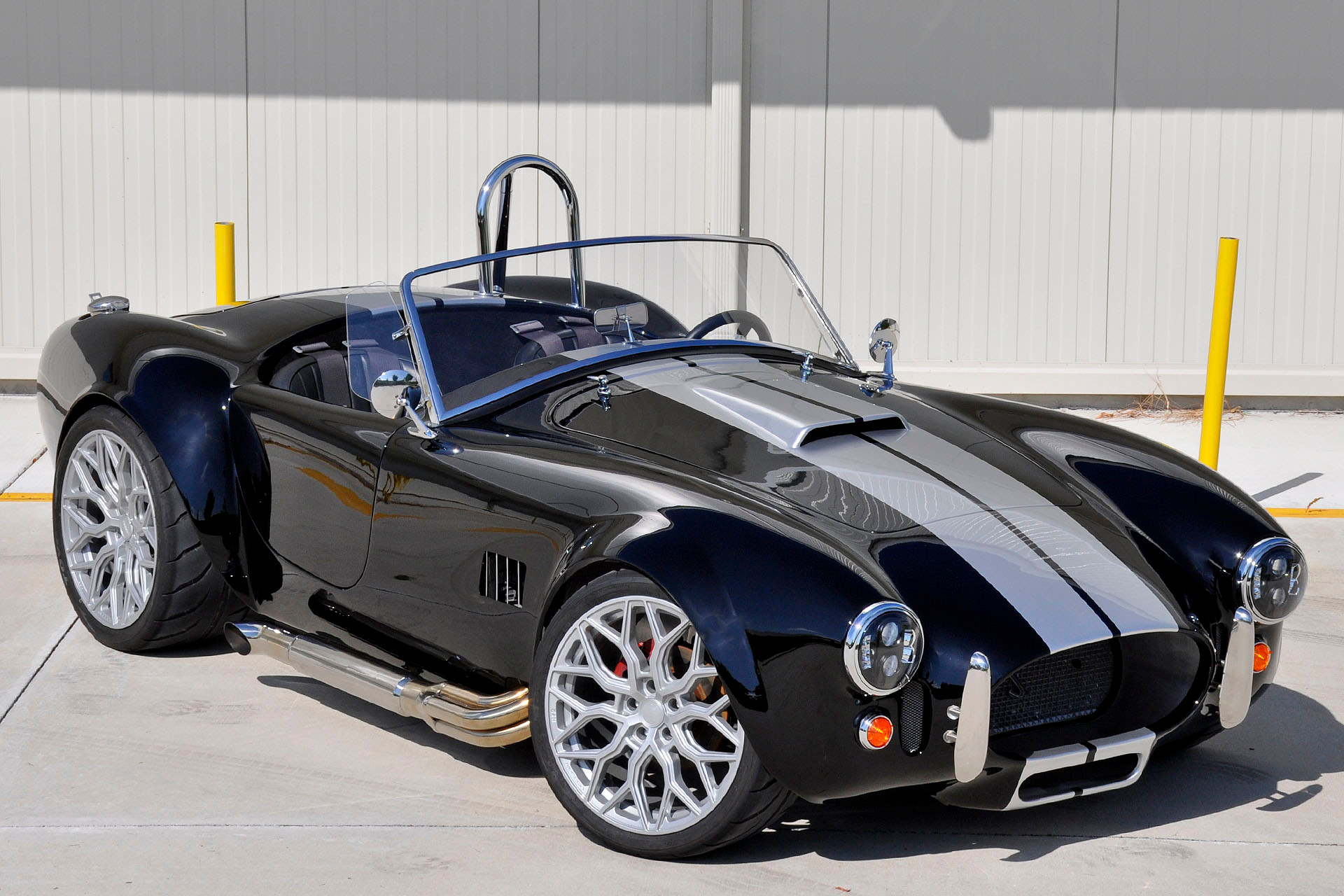 <img src="cobra.png" alt="A 1965 Cobra restomod up for grabs">