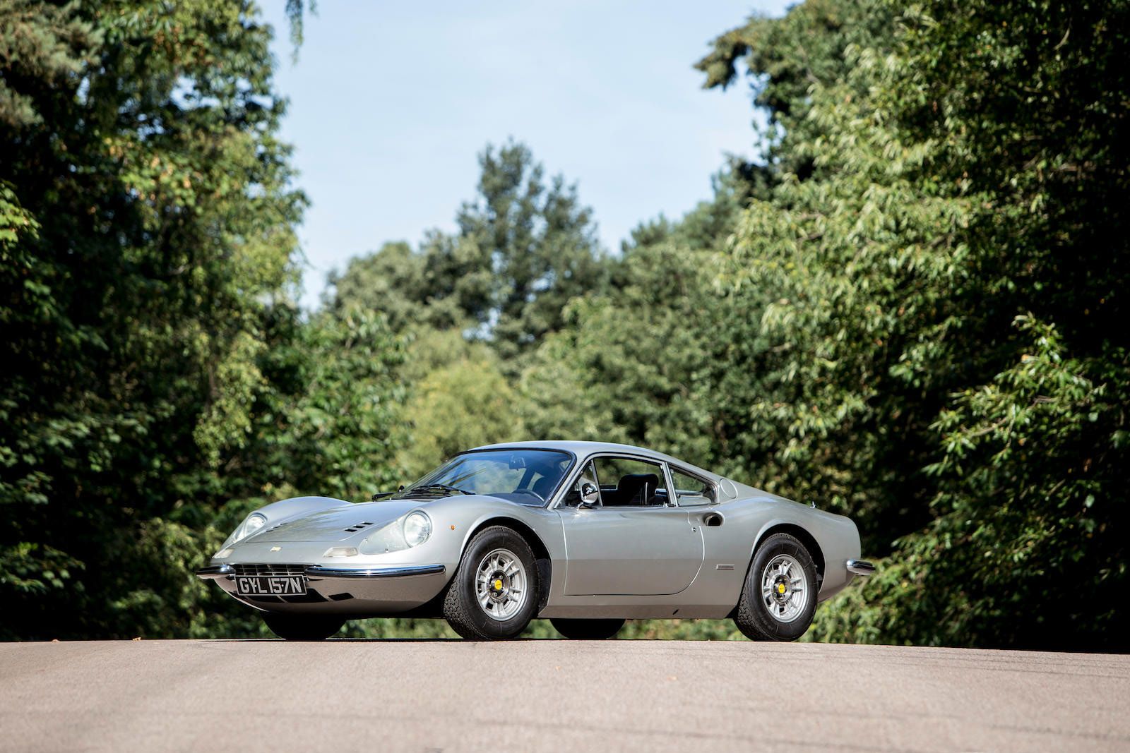 Ferrari Dino 246 gt. Феррари Стоун. Феррари Дино Rolling Stones. Автомобиль с касающимися порталами.