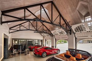 This Carriage House Turned Into A Fantasy Four-Bay Garage Is Goals