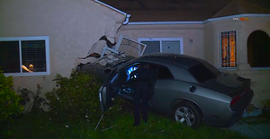 Most Outrageous Of 2020: Dodge Challenger Becomes Uninvited House Guest