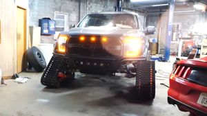A Ford Raptor With Tracks Looks Fun