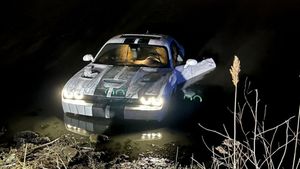 Chicago Dodge Challenger Drives Into Pond
