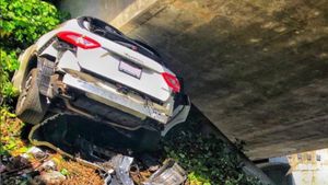 Man Fleeing Police Wedges Maserati Under The Highway