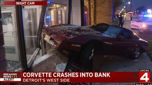 Corvette Crashes Into Bank