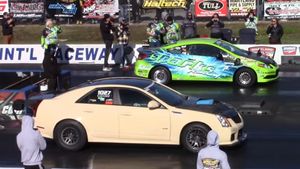 Twin-Turbo Cadillac CTS-V Races Turbo Honda Civics