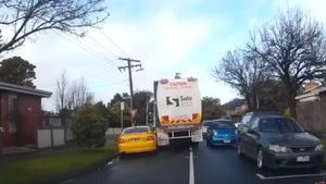 Garbage Truck Takes Out Australian Muscle Car