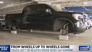 GMC Sierra Has Its Wheels Liberated In Airport Parking