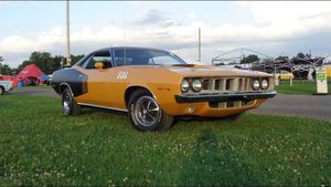 Childhood Memories Revved Up: Woman Continues Legacy with Her Inherited '71 Plymouth 'Cuda