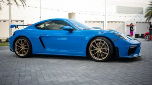 Seize Your Chance: The Shark Blue Porsche Cayman GT4 Awaits!