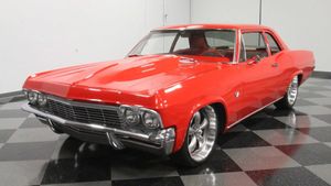 Classic 1965 Chevrolet Bel Air Stuns In A Glossy Red Coat