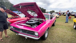 Woman Celebrates Decades with Her Cherished 1970 Plymouth 'Cuda