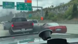 Diesel Truck Rolls Coal Into Corvette During Traffic Standoff