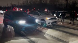 Dodge Durango Hellcat Races Jeep Trackhawk Beside Cops