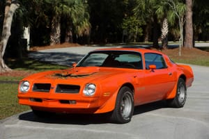 Unrestored 1976 Pontiac Trans Am in Rare Carousel Red Stuns on the Market
